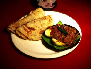 2 Kerala Parotta + Egg Roast