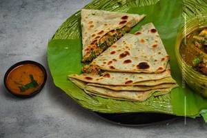 Chicken Kizhi Parotta