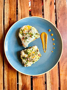 Poached Eggs On Garlic Tzatziki Toast