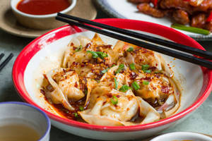 Steamed Chicken Wontons In A Spicy Sauce