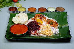 Pothichoru With Fish Curry
