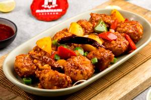 Fried Momos In Chilli-Garlic Sauce (10Pcs.)
