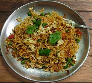 Egg peas tomato masala maggie .