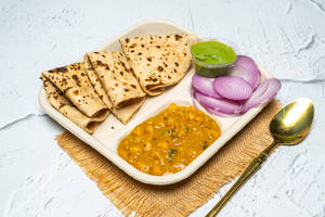 Dal tadka with butter tawa roti