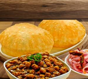 Chhole bhature (2 pcs bhature) with hot chole,green chatni,salad, pickle