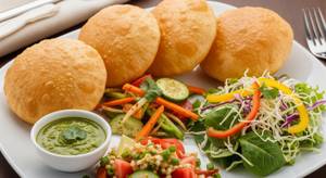 4 poori + veg + chutney + salad                  