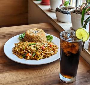 Veg noodles + Manchurian fried rice 200ml coke                           