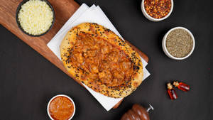 Sourdough Butter Chicken Naanza.