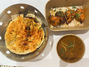 Half Dhaba Murgh Tikka (4pc) + Chicken Curry (2pc) + 2 Dhaba Roti