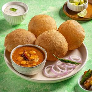 Poori & Aloo Ki Rasiloo (Made with Pure Ghee).