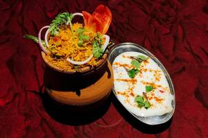 Veg Matka Biryani With Raita