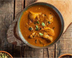 Kozhi Chicken Curry (bone)