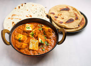 Handi Paneer Butter Masala+2 Tandoori Roti/Naan/4 Tawa Roti+Salad
