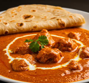 Butter Chicken +2  Rumali Roti