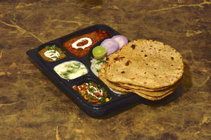 Curry Paneer+Biryani+2 Tandoori Roti+Gulab Jamun +Raita+Salad+Pickle