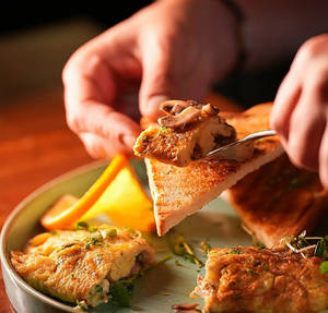 Fresh Herbs Mushroom Stuffed Omelette With Feta Cheese