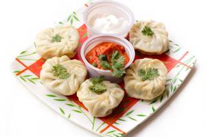 Cheese Corn Momos with Schezwan Sauce