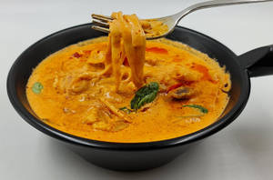 Spicy Thai Curry Flat Rice Noodle Bowl