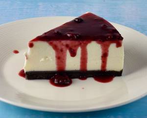 Raspberry Compote + Exquisite New York Cheesecake Slice
