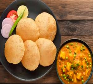 Poori with mater paneer