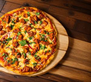 Chicken tikka pizza (chicken tikka with extra cheese onion, tomato, capsicum)