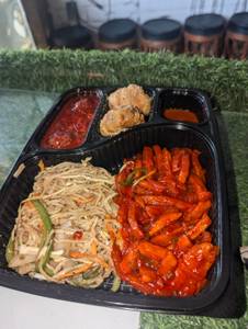 Manchurian Gravy + Chilly Potato + Veg Noodles + Veg Momo 2 Pcs + Cold Drink (250 ml)