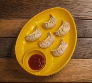 Chicken shezwan  streamed momo [5 pieces]