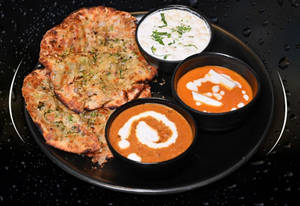 Aloo Pyaaz Paneer Amritsari Kulcha with Paneer Makhani