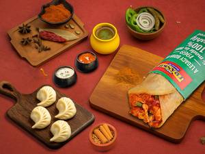 Paneer Tikka Frankie Roll + Choice Of Steamed Momos (4 Pcs)