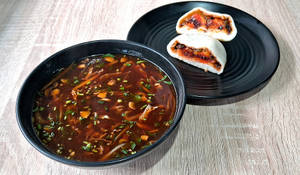 Hot And Sour Soup Veg With Chilly Mushroom Bun (1 Pc)
