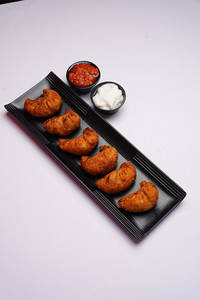 Fried Schezwan Paneer Momos