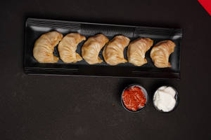 Steamed Schezwan Chicken Momos