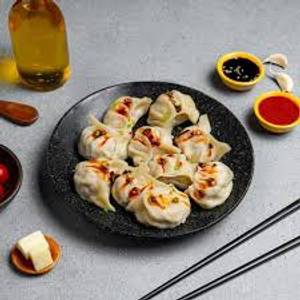 O cheesy chicken momos