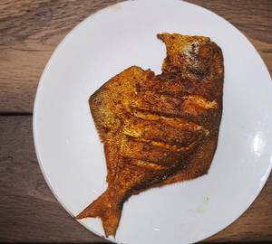 Pomfret Masala Fry Served with Onion Salad