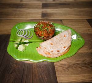 Paratha with barbeque chicken masala curries