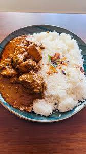 Ghee rice with chicken curry