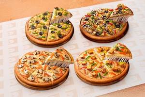 The Celebration Combo Veg-(3 Veg Pizza) & (One Pizza Free)