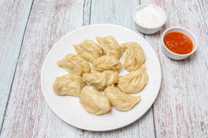 Chicken steamed momos [5 pieces]