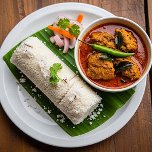 Puttu with chicken curry