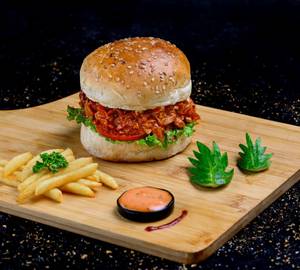 Bbq Chicken Burger Coated With Bbq Sauce Added To Pickle Onions And Lettuce