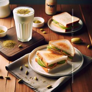 Veg sandwich with Mango lasi                           