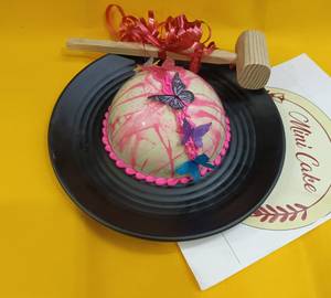 Chocolate half round pinata flower cake