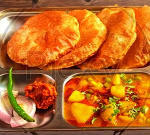 4 Puri With Sabji(4 pcs puri+ aloo masala gravy+ salad)
