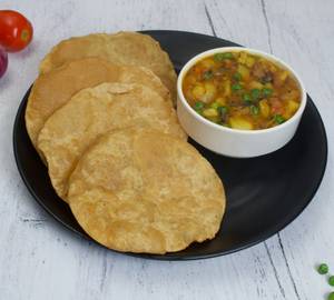 Poha + Poori Sabji + 2 Cup Of Ginger Tea