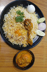 Chicken Biryani With Chicken Chaap( 1 Piece) Combo