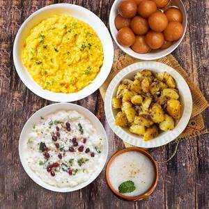 Saadi Khichdi + Curd Rice + Aloo Jeera + 2 Gulab Jamun + 2 Buttermilk