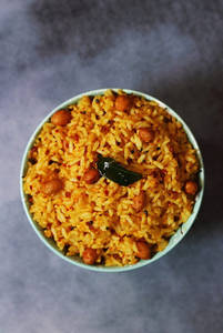 Puliyotharai Rice