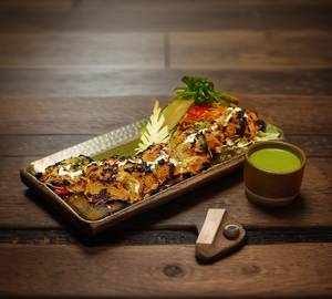 Chicken spiked cream and onion kabab