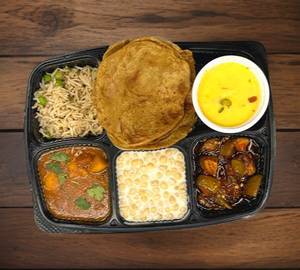 Celebration Thali(4puri+ Paneer vegi+ G vegi+Mix raita+Salad+Achar+Gulabjamun)