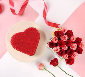 Heart shape red valvet cake with rose bunch